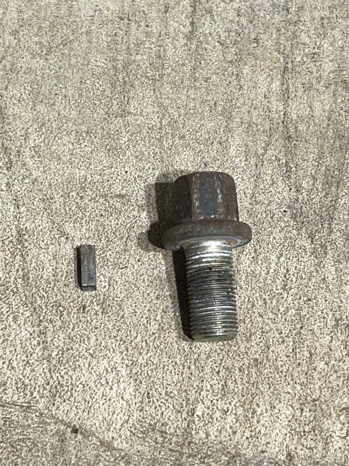 Crankshaft bolt and key close-up